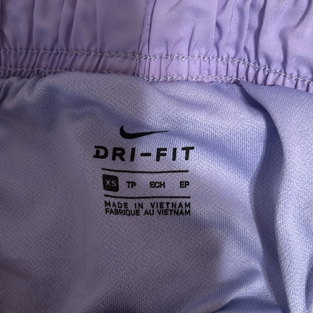 Nike Multicolor Tie-Dye Athletic Shorts with Purple Trim‎
